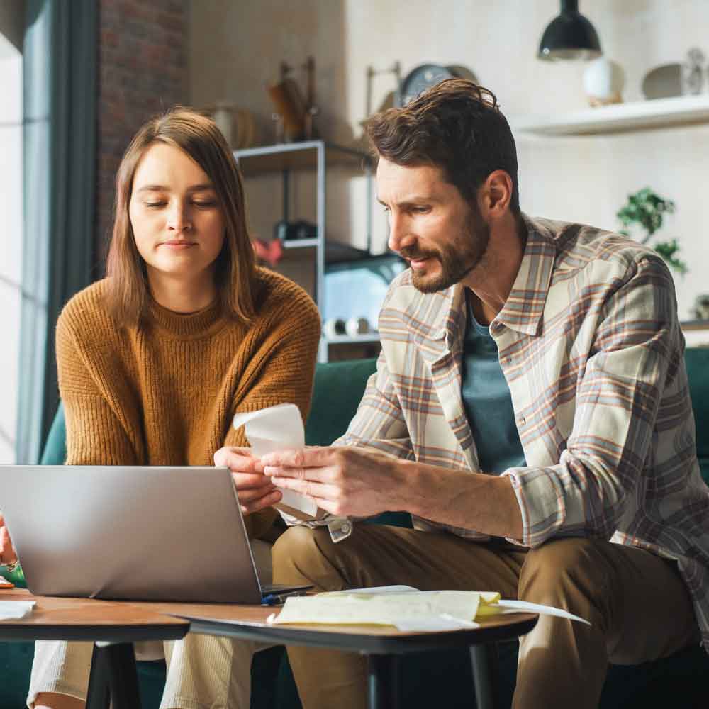 couple-doing-taxes Couples Doing Taxes | Koida Tax and Accounting